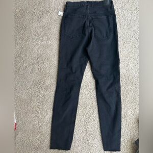 New with tags black ripped jeans